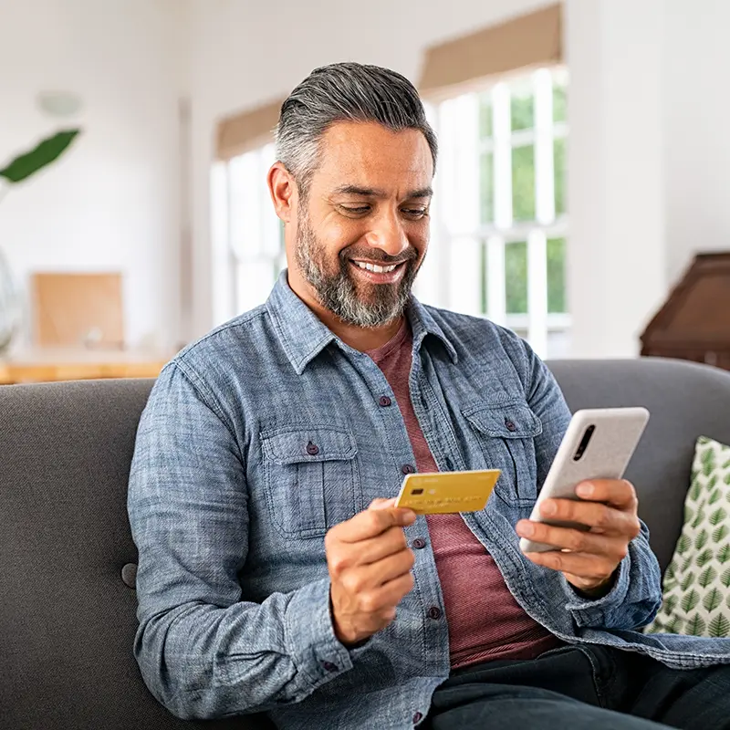 man with debit card
