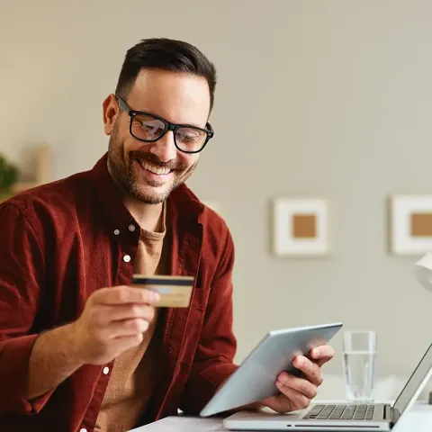 man with debit card